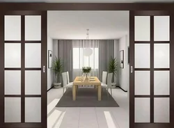 Sliding interior doors in the living room interior