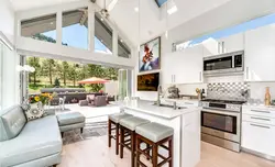 Combined living room with kitchen with access to the terrace photo