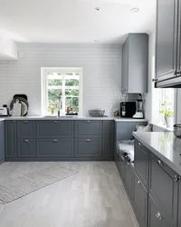 Kitchen With Gray Floor In The Interior Photo