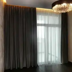 Chocolate curtains in the living room interior