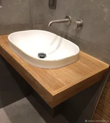 Overhead washbasin in the bathroom photo