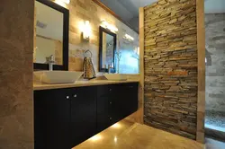 Bath interior with stone tiles