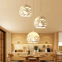 Photo of a house kitchen with chandeliers