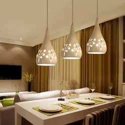 Photo of a house kitchen with chandeliers