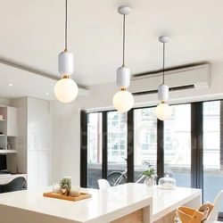 Photo of a house kitchen with chandeliers