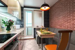 Kitchen 10 square meters photo with sofa and balcony