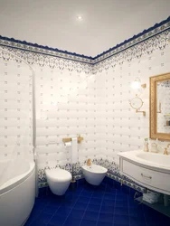 Blue And White Tiles In The Bathroom Photo