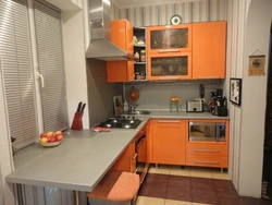Arrange furniture in a small kitchen photo