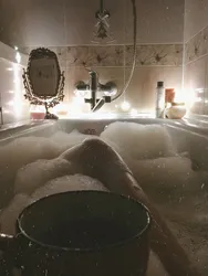 Photo In The Bathtub In The Foam