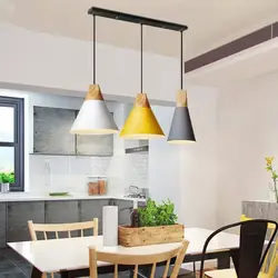 Pendant lamps in the kitchen above the table photo in the interior
