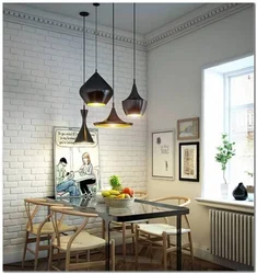 Pendant lamps in the kitchen above the table photo in the interior