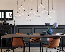 Pendant lamps in the kitchen above the table photo in the interior