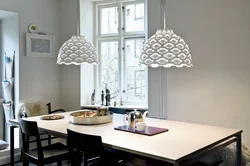 Pendant lamps in the kitchen above the table photo in the interior