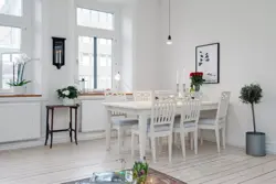 Интерьер кухни с белым столом