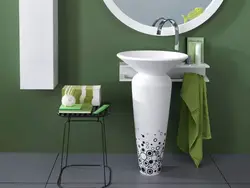 Sink with pedestal in the bathroom interior