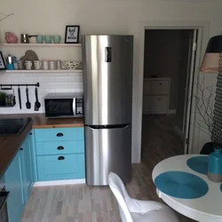 Kitchen interior refrigerator by the window