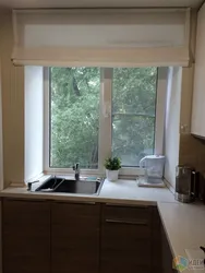 Photo of a small kitchen by the window