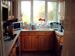 Photo of a small kitchen by the window