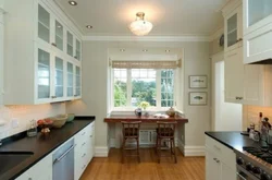 Photo of a small kitchen by the window