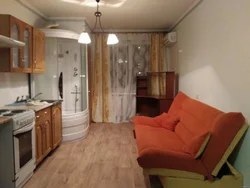 Room With Kitchen And Toilet Photo