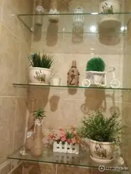 Artificial flowers in the bathroom photo