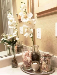 Artificial Flowers In The Bathroom Photo