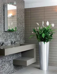 Artificial flowers in the bathroom photo