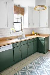 Green Kitchen With Wooden Countertops In The Interior