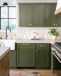 Green Kitchen With Wooden Countertops In The Interior