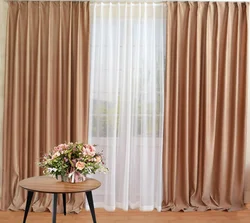Color of curtains for brown wallpaper in the living room photo