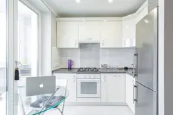White corner kitchens in a modern style photo in the interior