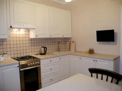 White corner kitchens in a modern style photo in the interior