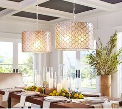 Chandelier above the dining table in the kitchen photo