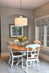 Chandelier above the dining table in the kitchen photo