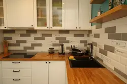 Boar tiles on the apron photo in the kitchen interior