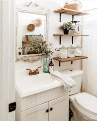 Bathroom design with shelves in the wall