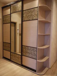 Hallway design in an apartment with a wardrobe photo in light colors