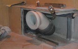 Box in the bathroom for pipes in the interior