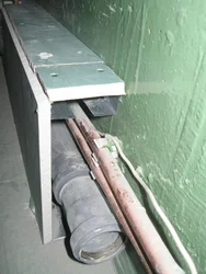 Box In The Bathroom For Pipes In The Interior