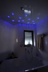 Photo of suspended ceilings in the bathroom with lighting