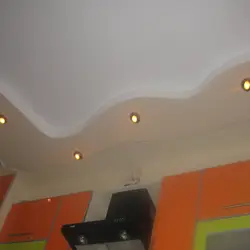 Plasterboard Ceiling With Lighting Two-Level Design In The Kitchen