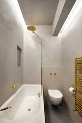 Дәретхана дизайны бар ұзын ванна