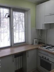 Kitchen 5 square meters Khrushchev with a column photo