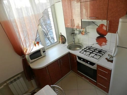 Kitchen 5 square meters Khrushchev with a column photo