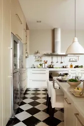 Photo Of White Tiles On The Kitchen Floor