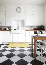 Photo Of White Tiles On The Kitchen Floor