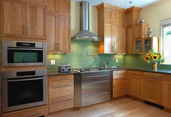 Green countertop in the kitchen interior