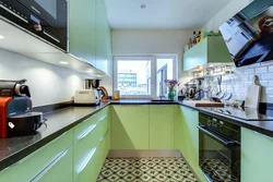 Green countertop in the kitchen interior