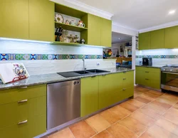 Green countertop in the kitchen interior