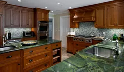 Green countertop in the kitchen interior